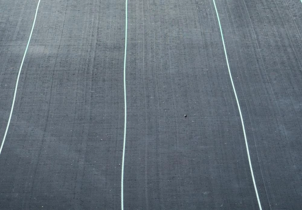 RSI Landscape Fabric & Stakes Premium Landscape Fabric (Common: 3-ft x 150-ft; Actual: x 150-ft) 4 RSI Landscape Fabric & Stakes Premium Landscape Fabric (Common: 3-ft x 150-ft; Actual: x 150-ft) - Image 4